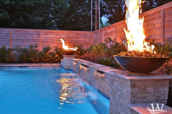 fire and water pool design with waterfall