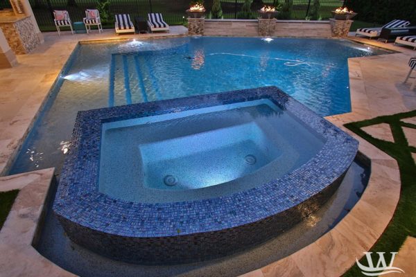 custom fire pits and overflow pool