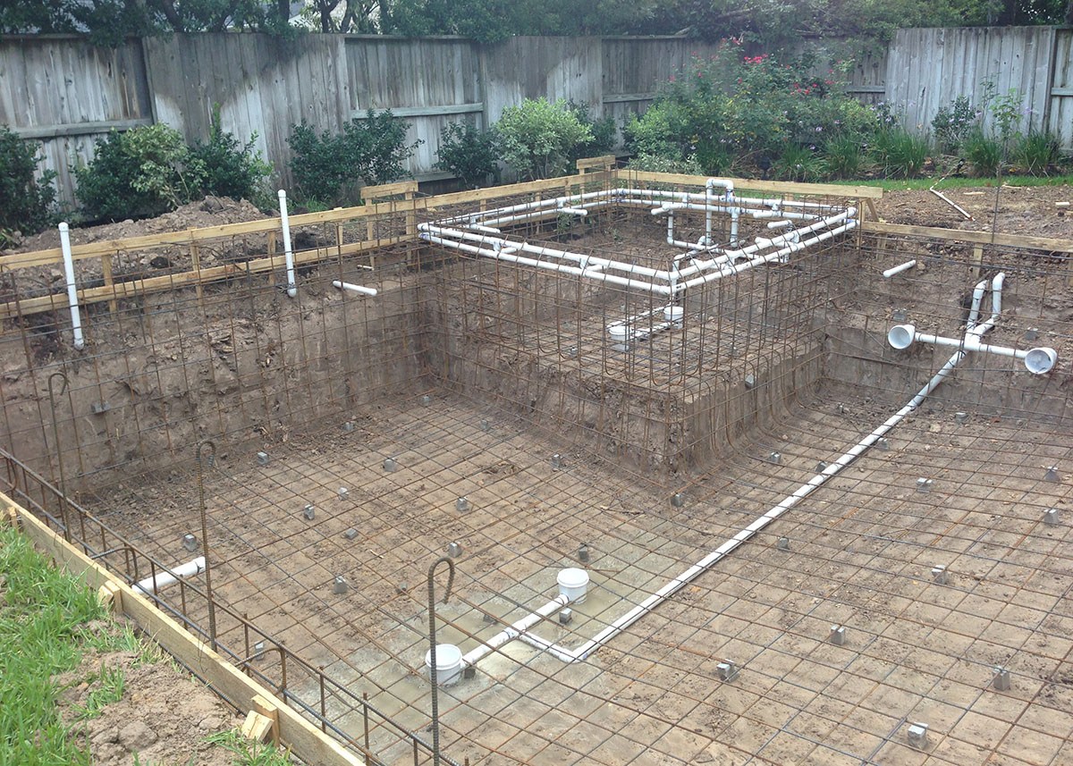 preparing to pour cement for a swimming pool